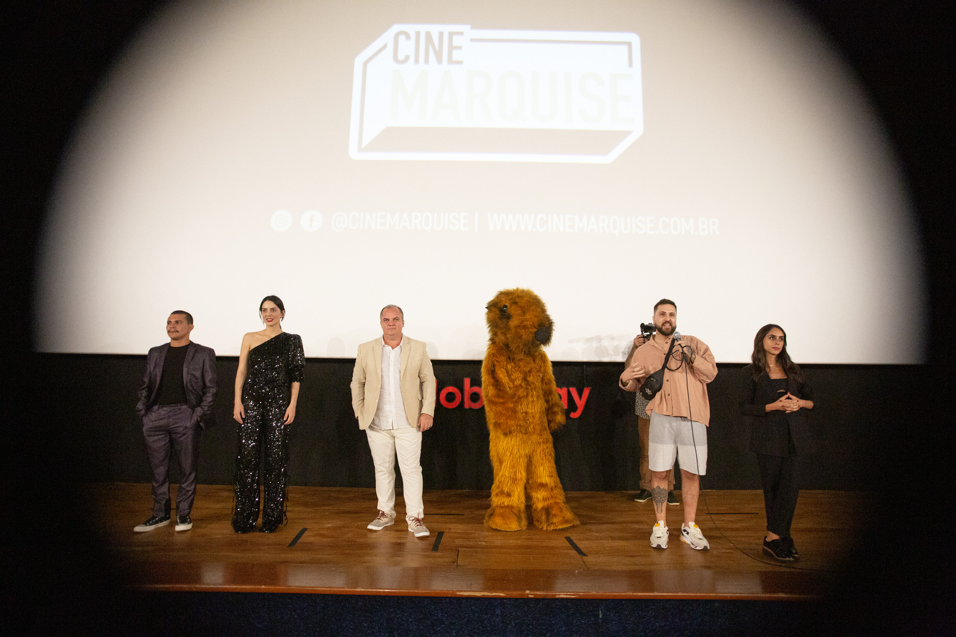 Cast and crew on stage at Cine Marquise - São Paulo Premiere